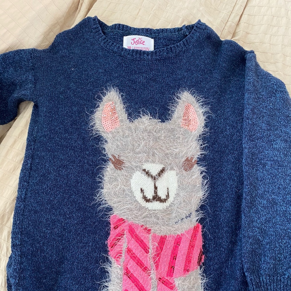 Justice sweaters and